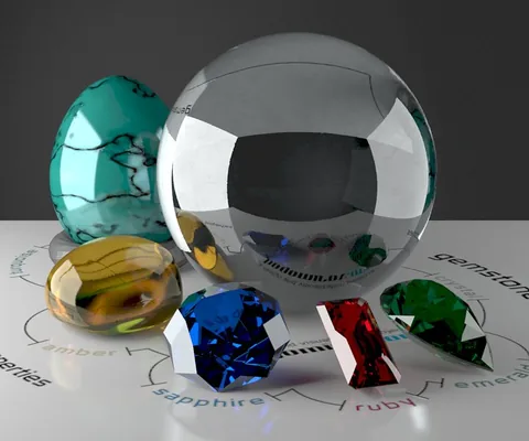 Faceted coloured gemstones grouped beside polished spheres.
